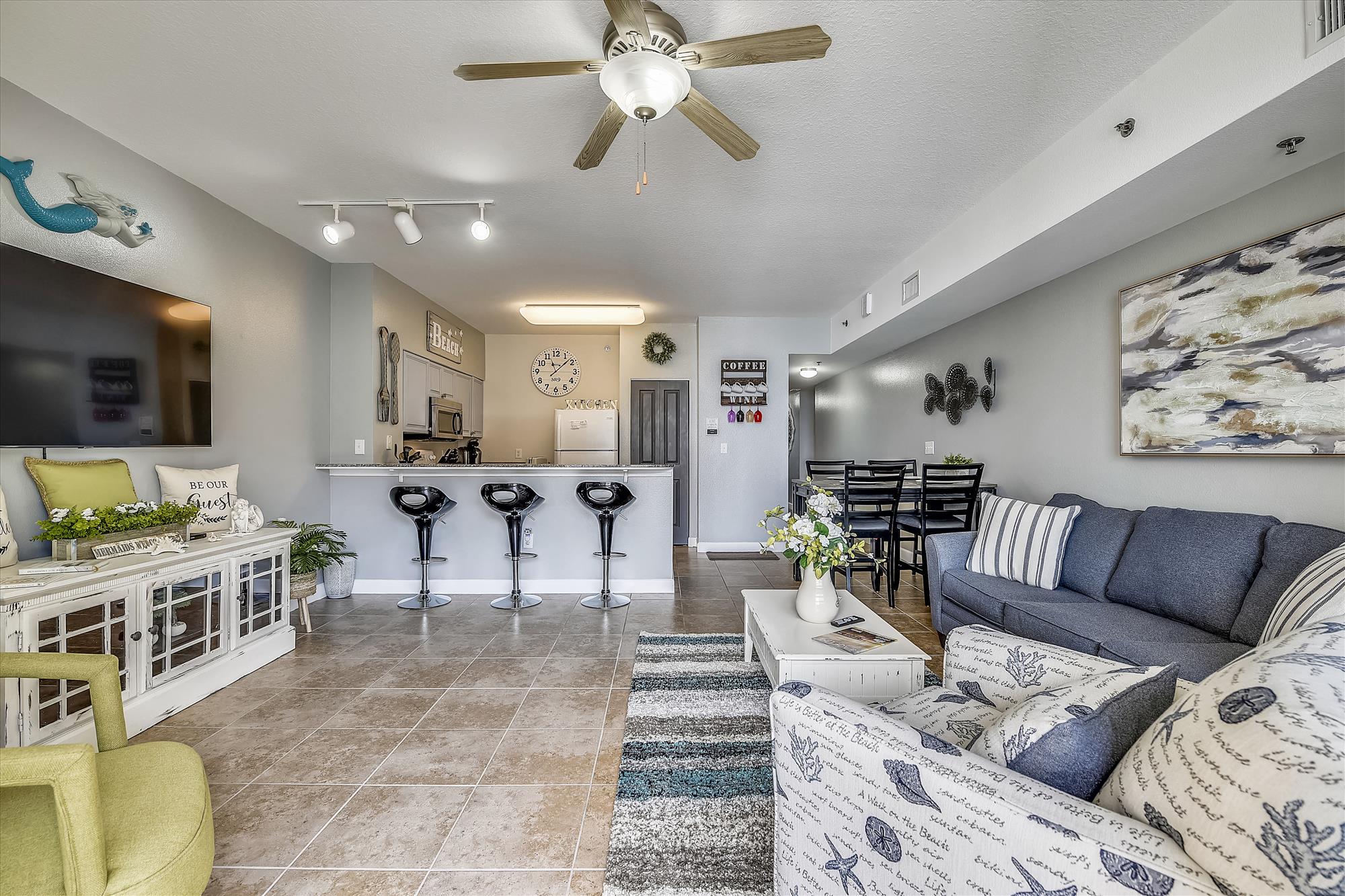 view of condo living area and kitchen