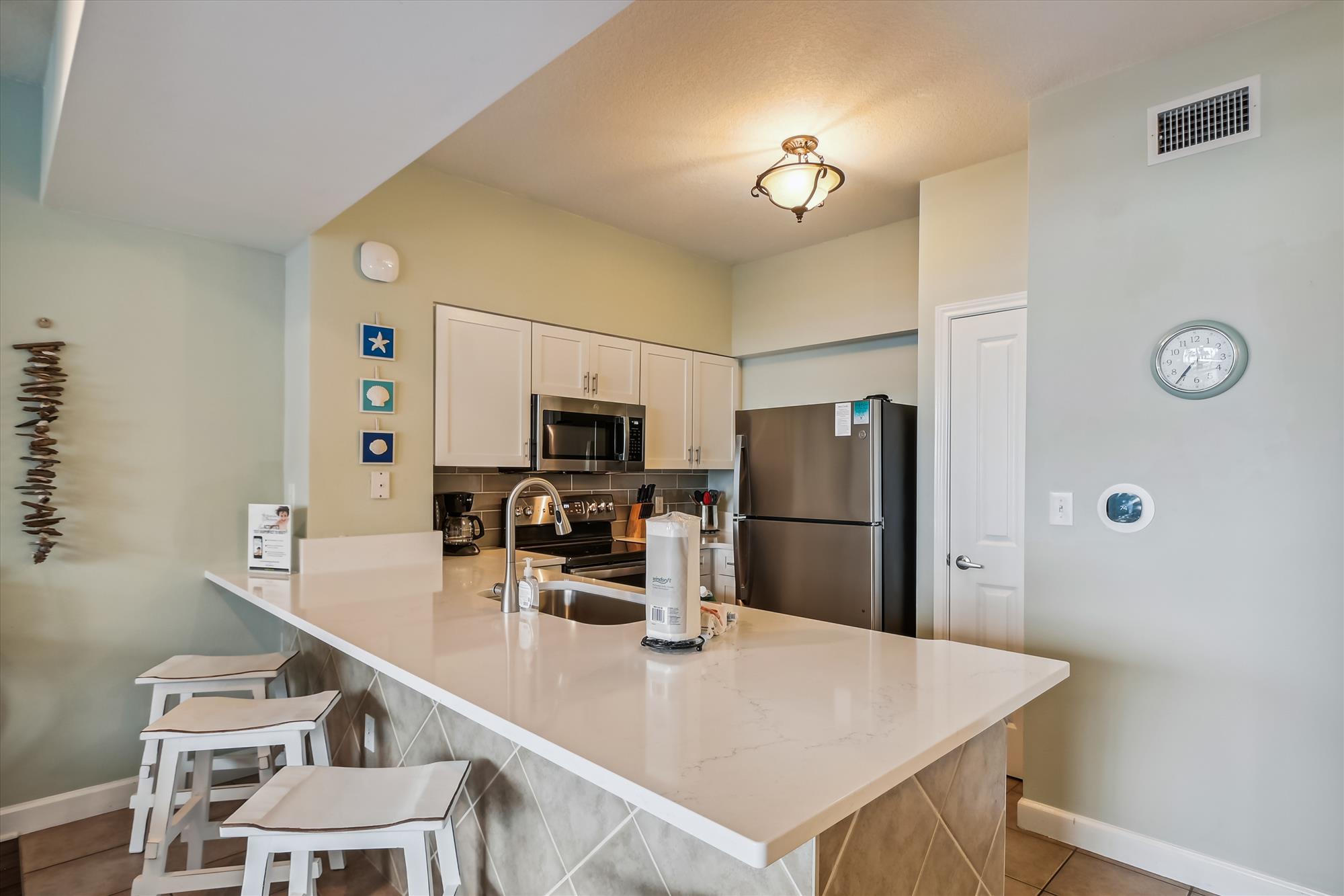 The kitchen in one of our VRBO rentals in Panama City Beach
