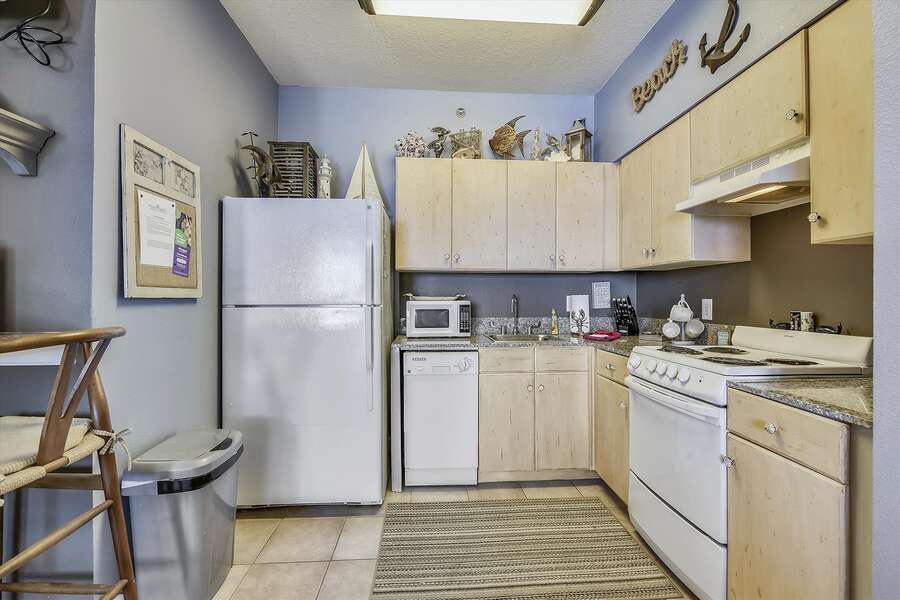 A full kitchen in a vacation rental available on book direct day 2025 