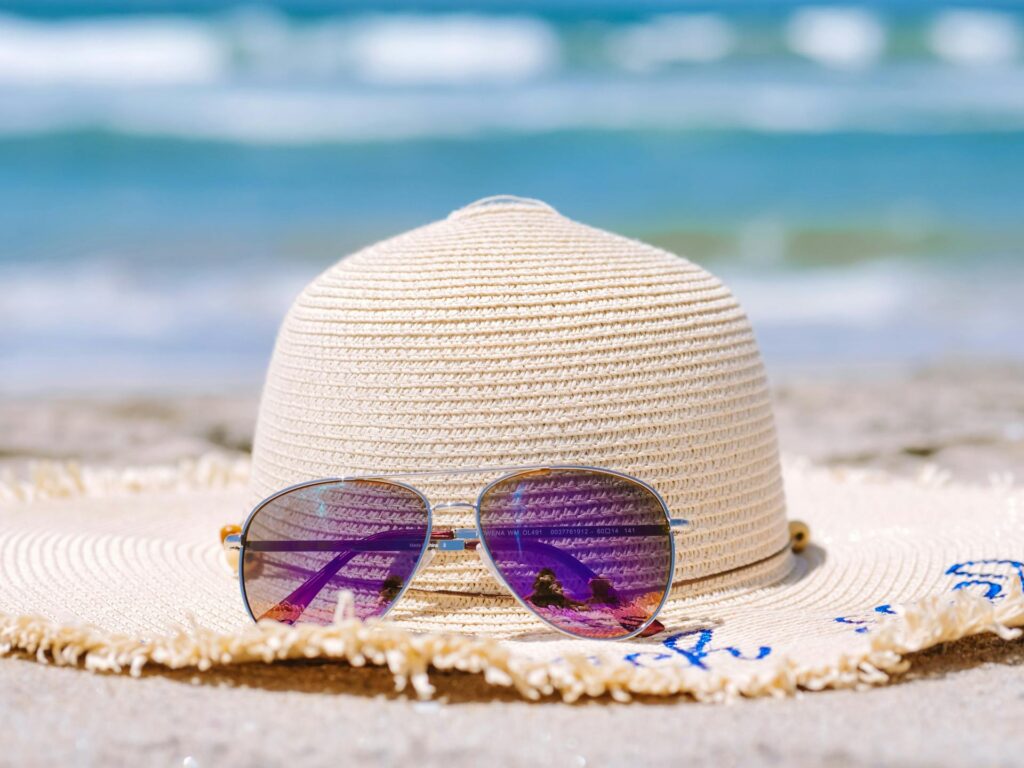 Sunglasses with a beach hat